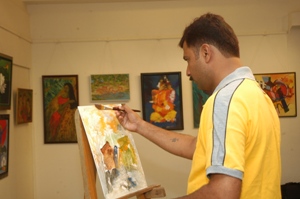 Painting demonstration by Shrikant Kadam at Artfest 09, Indiaart Gallery